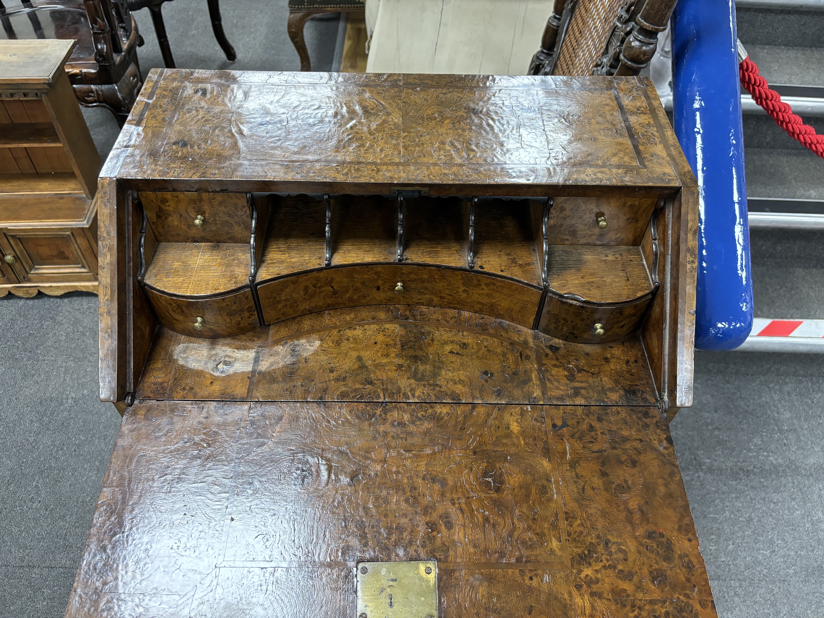 A banded burr walnut bureau on barley sugar twist supports, c.1800, width 56cm, height 94cm, Please note this lot attracts an additional import tax of 5% on the hammer price